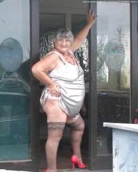 Libby in high-heeled slippers and pantyhose