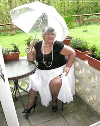 Libby in high-heeled slippers and pantyhose
