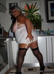 Libby in high-heeled slippers and pantyhose