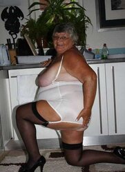 Libby in high-heeled slippers and pantyhose