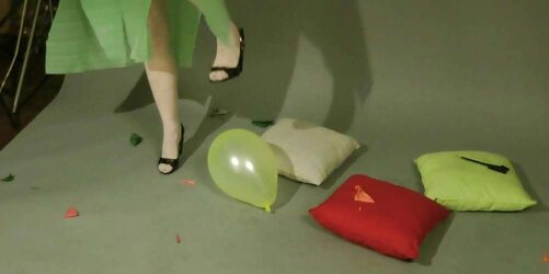 Redhead lean Lisa popping balloons