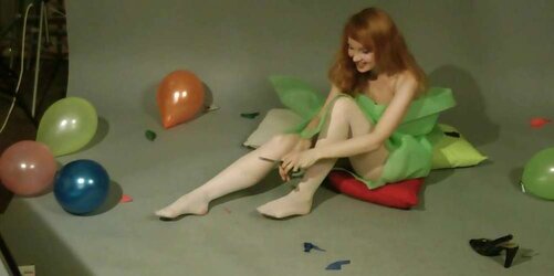 Redhead lean Lisa popping balloons