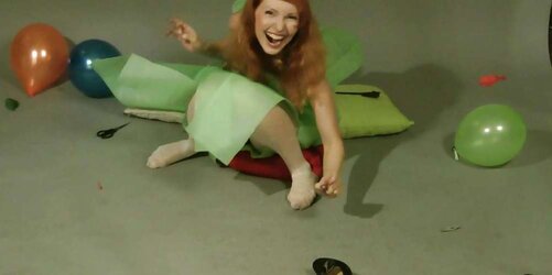 Redhead lean Lisa popping balloons