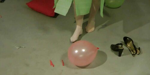 Redhead lean Lisa popping balloons
