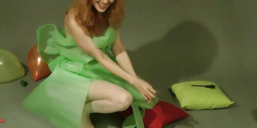 Redhead lean Lisa popping balloons