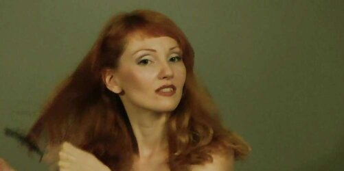 Redhead lean Lisa popping balloons