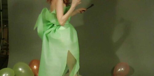 Redhead lean Lisa popping balloons