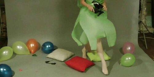 Redhead lean Lisa popping balloons