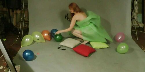 Redhead lean Lisa popping balloons