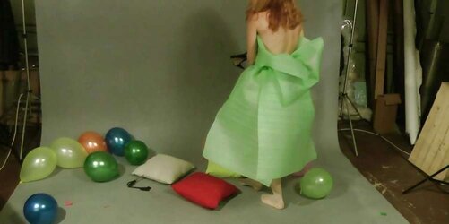 Redhead lean Lisa popping balloons