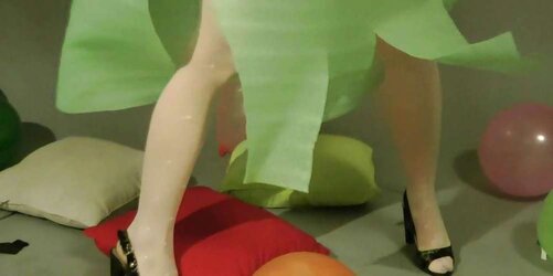 Redhead lean Lisa popping balloons
