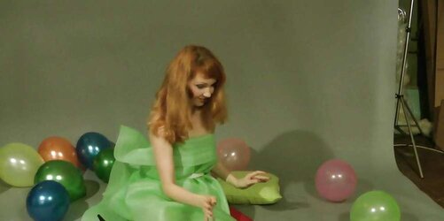 Redhead lean Lisa popping balloons