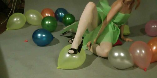 Redhead lean Lisa popping balloons