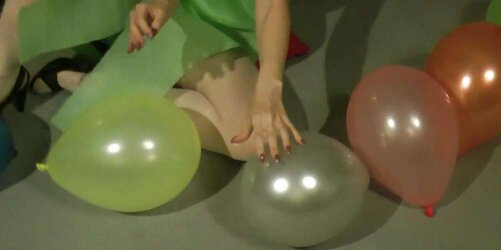 Redhead lean Lisa popping balloons