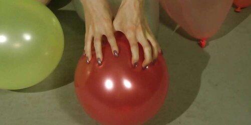 Redhead lean Lisa popping balloons