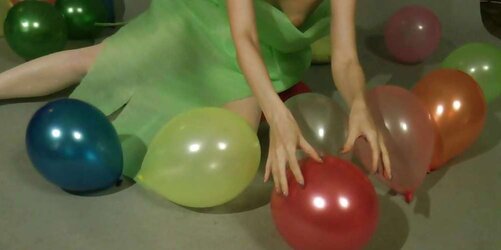 Redhead lean Lisa popping balloons