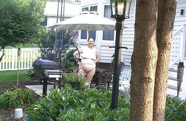 Mature naturist duo nude outside in public