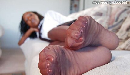 Dark-Hued Damsel In Nylon