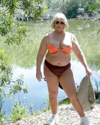 Saggy hooters in swimsuit.