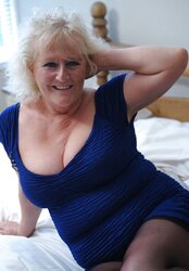 Old fledgling grandma plays with pinkish fake penis