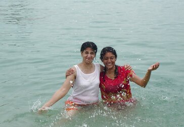 Indian Women bathing at sea ganga