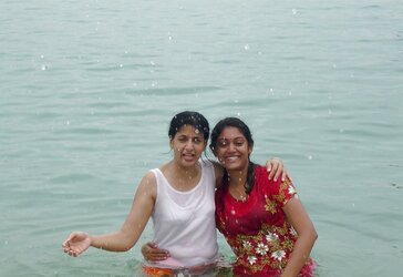 Indian Women bathing at sea ganga