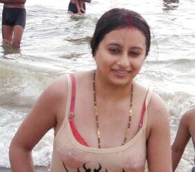 Indian Women bathing at sea ganga