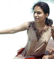 Indian Women bathing at sea ganga