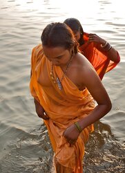 Indian Women bathing at sea ganga