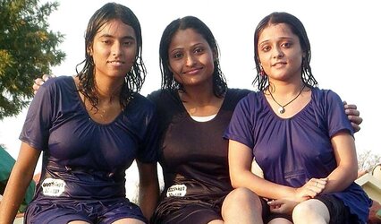 Indian Women bathing at sea ganga