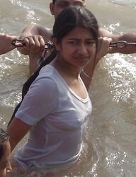 Indian Women bathing at sea ganga