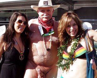 Chicks posing next to a jizz-shotgun