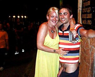 Chicks posing next to a jizz-shotgun