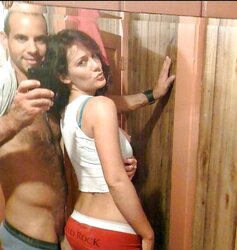 Chicks posing next to a jizz-shotgun