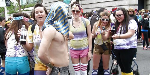 Chicks posing next to a jizz-shotgun