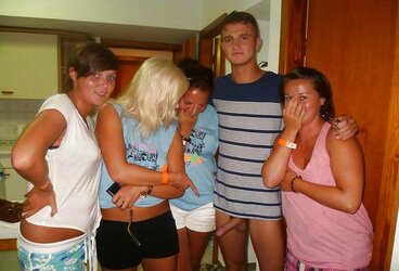 Chicks posing next to a jizz-shotgun