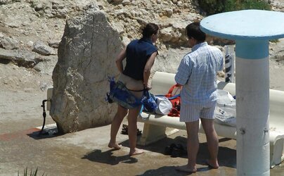 Beach unwrapping, de-robe or getting bare