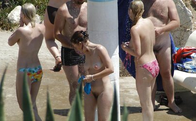 Beach unwrapping, de-robe or getting bare