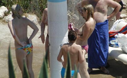 Beach unwrapping, de-robe or getting bare