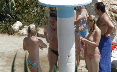 Beach unwrapping, de-robe or getting bare
