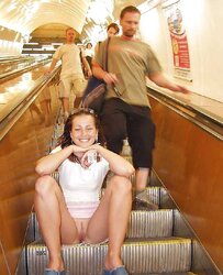 Upskirt and public snatch showing.