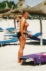 Teenager with phat bra-stuffers on the beach