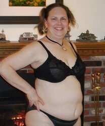 Kinky mom lets her step son examine her furry slit