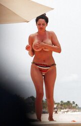 Kelly Brook Bra-Less On The Beach In Cancun