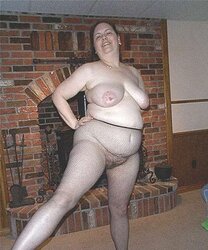Fur Covered mom posing in fishnet stockings for junior neighbor