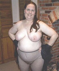 Fur Covered mom posing in fishnet stockings for junior neighbor