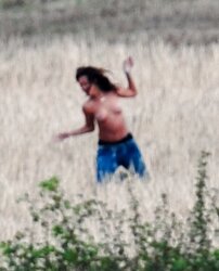 Rihanna bare-chested