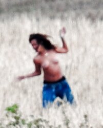Rihanna bare-chested