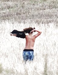 Rihanna bare-chested