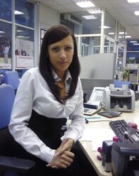 An employee of the bank with standing nips